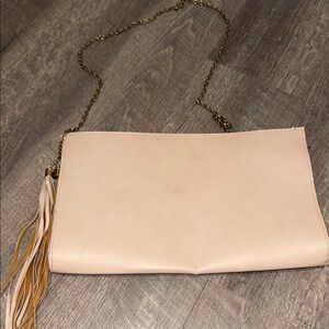 Chic Cream Clutch with Tassel Accent